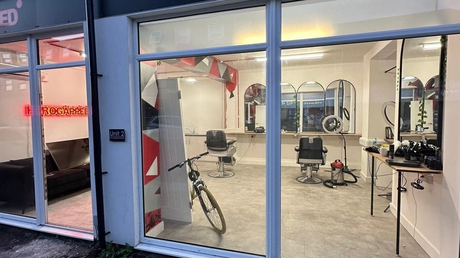Studio interior with red and black geometric wall art