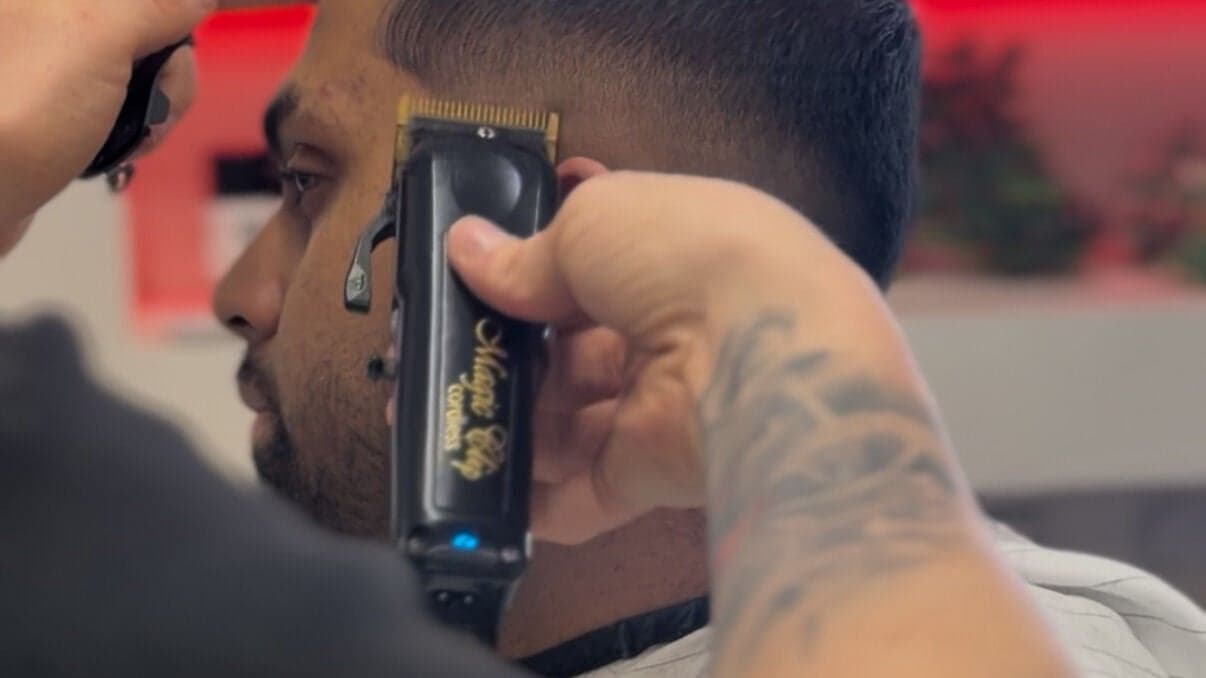 Skin fade in progress at HeroGapped Barber Studio
