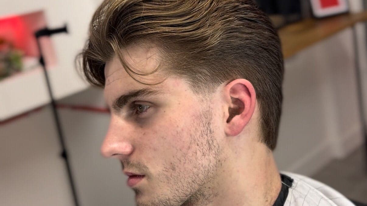 Finished fade haircut, back view